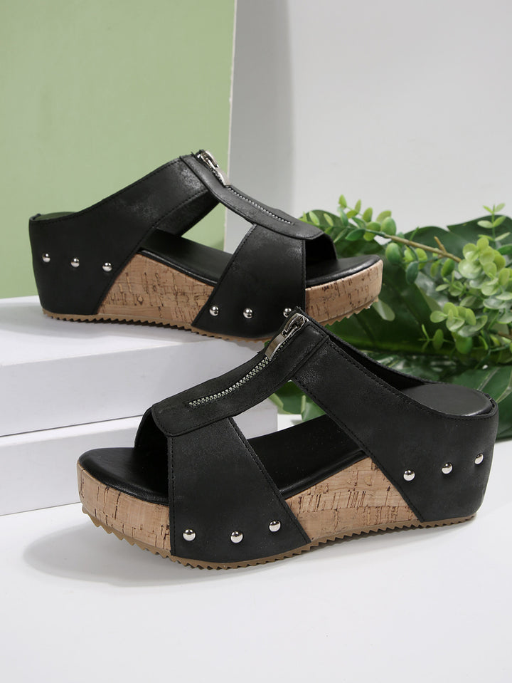 Dame Wedge-Pantoletten med stilfuld lynlås og elegant korksål Stilla