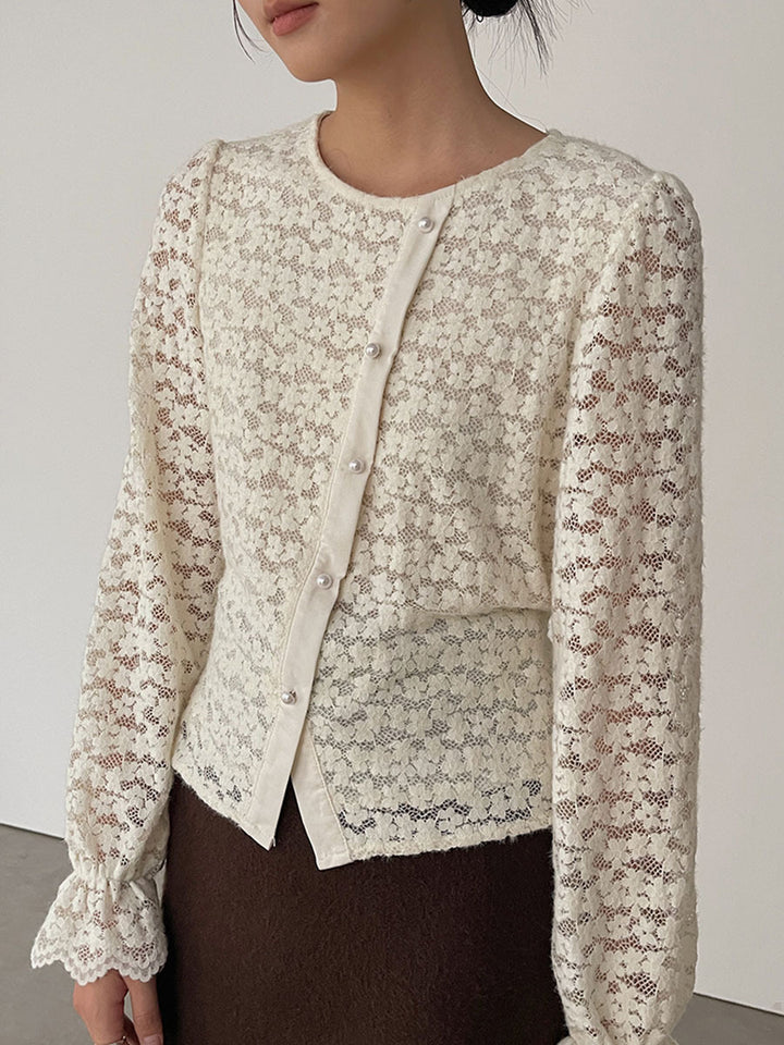 Dame elegant spidsbluse med knapdetaljer og lange ærmer Stilla