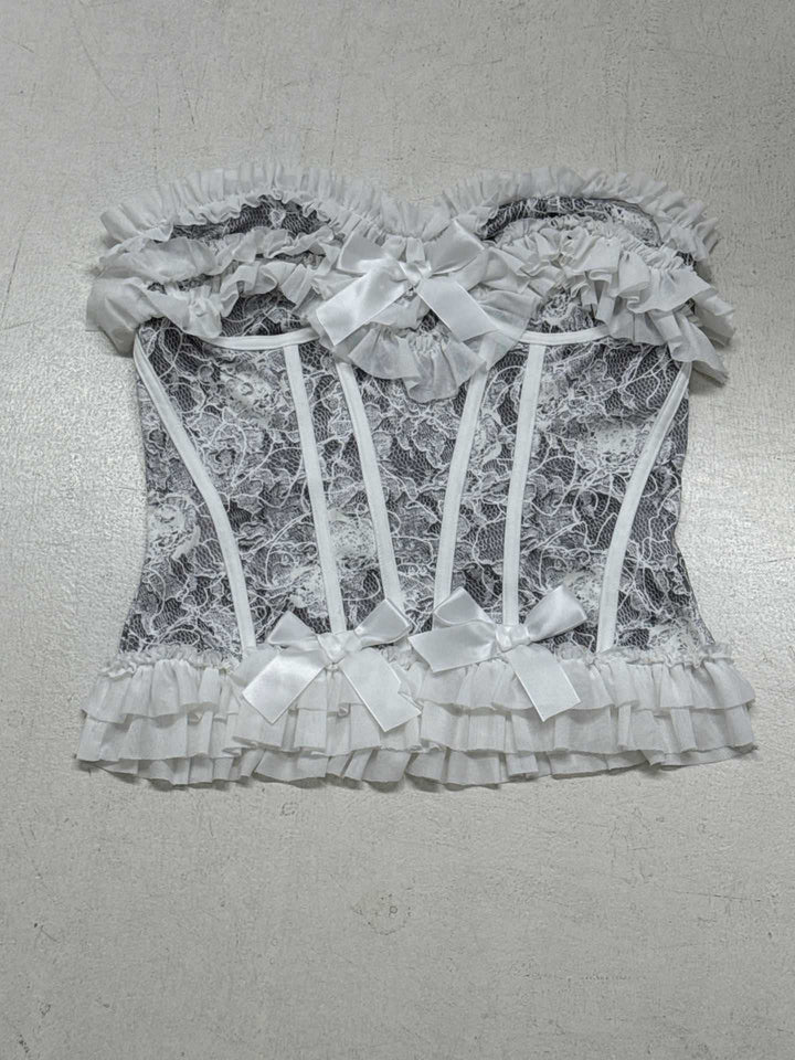 Dame spids-bustier med ruffles detaljer og sløjfer Skovae
