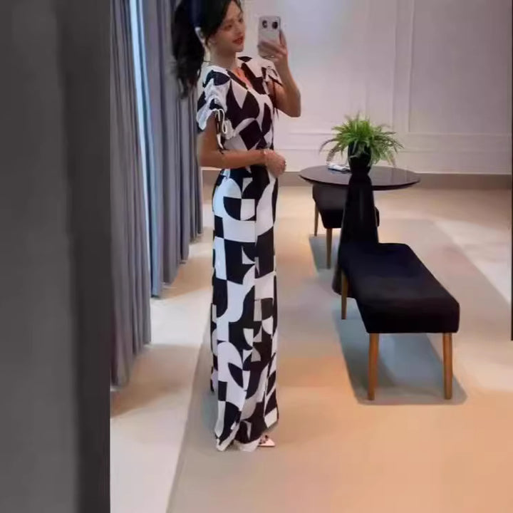 Dame Modet Jumpsuit med grafisk mønster og elegante ærmer Skovae