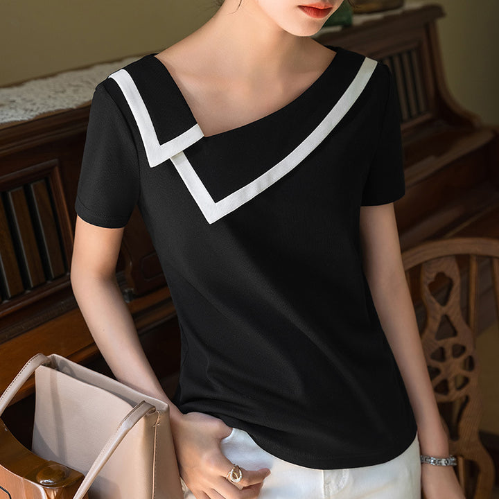Dame elegant top med en moderne asymmetrisk krave og stilfulde kontrastaccenter Stilla