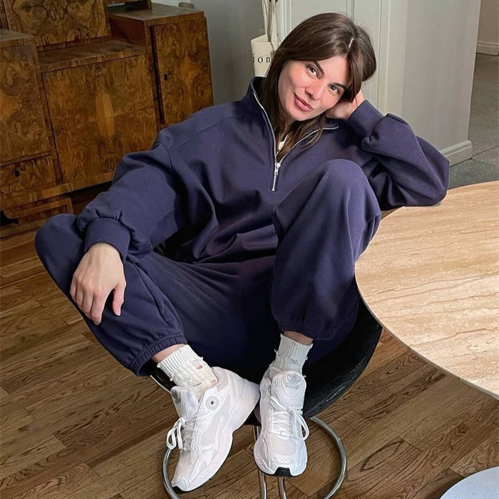 Dames sporty sweat sæt med halv lynlås og brede ben Skovae