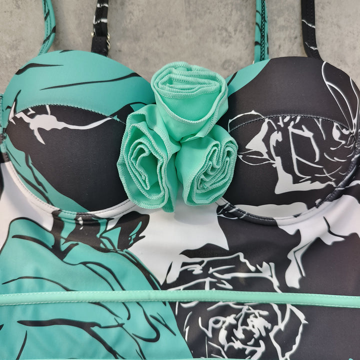 Dame badedragt med blomstret design og raffinerede stropdetaljer Stilla