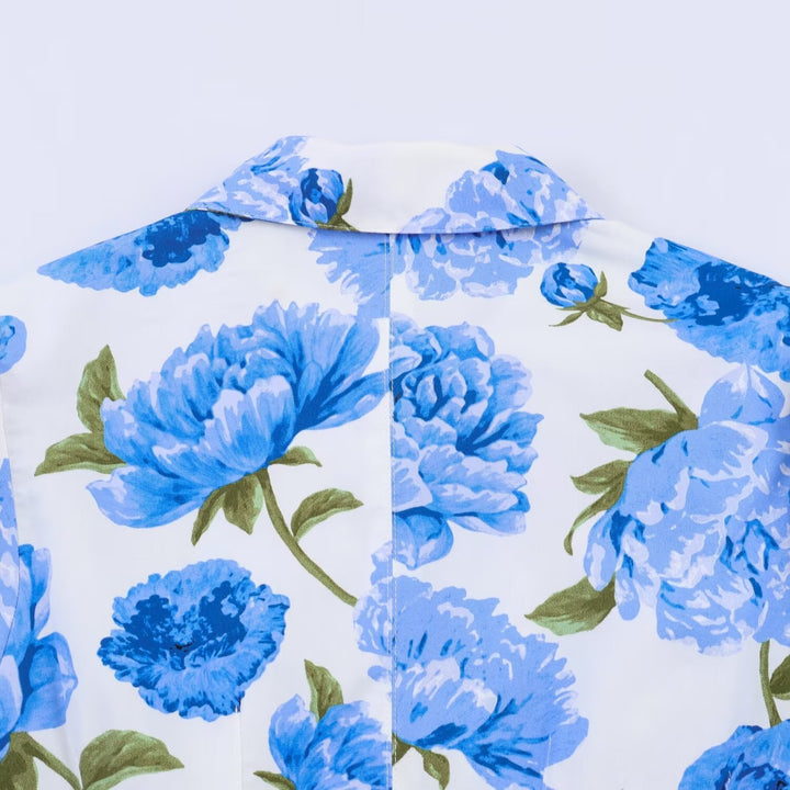 Damebluse med blomstermønster og elegante pufærmer Skovae