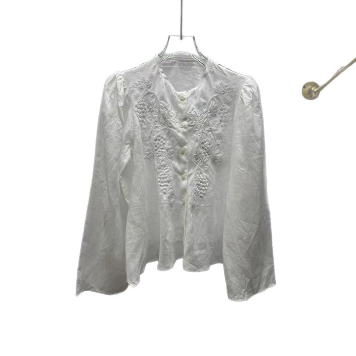 Damebluse med romantiske broderier og voluminøse ærmer Stilla