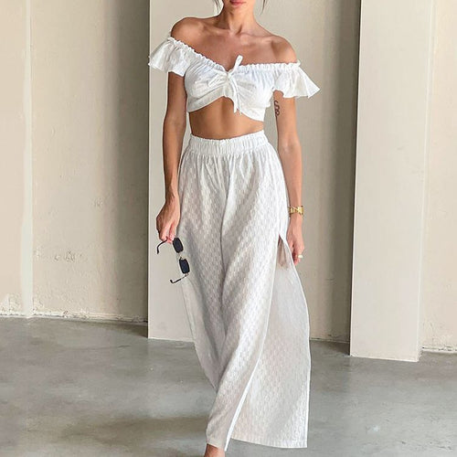 Dame sæt bestående af skulderfri crop-top og højt skåret maxiskørt Stilla