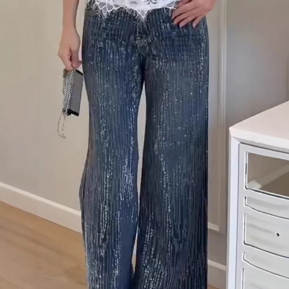 Kvindernes glitrende bredskårede jeans med elegant struktur Stilla