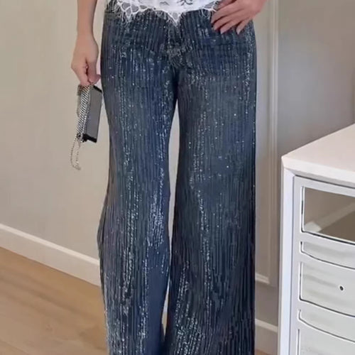 Kvindernes glitrende bredskårede jeans med elegant struktur Stilla