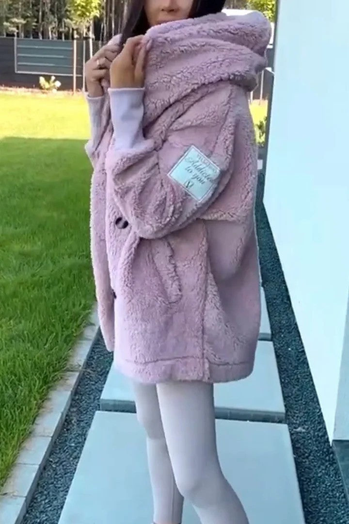 Kvinders teddy-fur jakke med klassisk krave og praktiske lommer Stilla