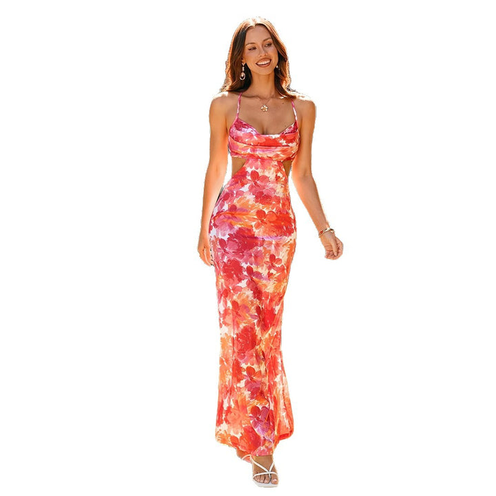 Dame Elegant sommerkjole med cut-out-detaljer og blomsterdesign Stilla