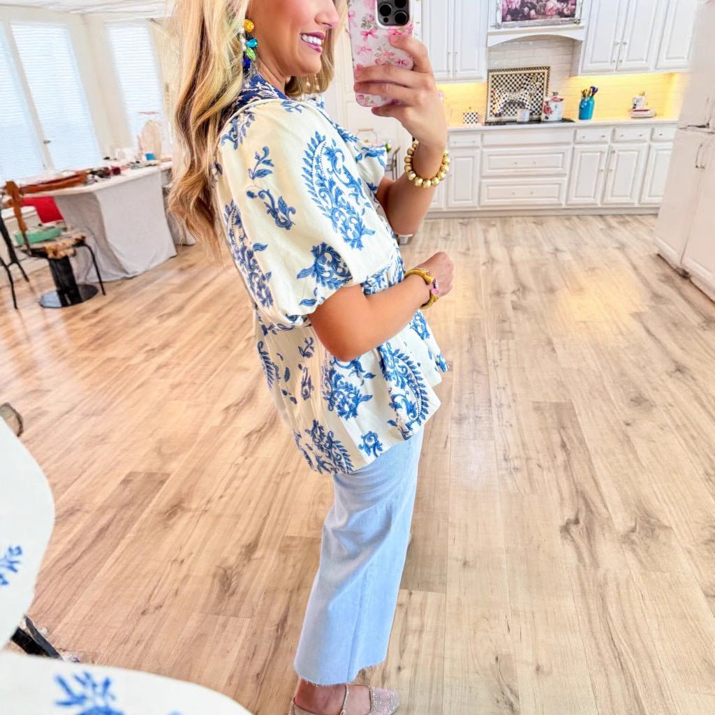 Dame legende skåret bluse skjorte med blomstret design og unikt krave Stilla