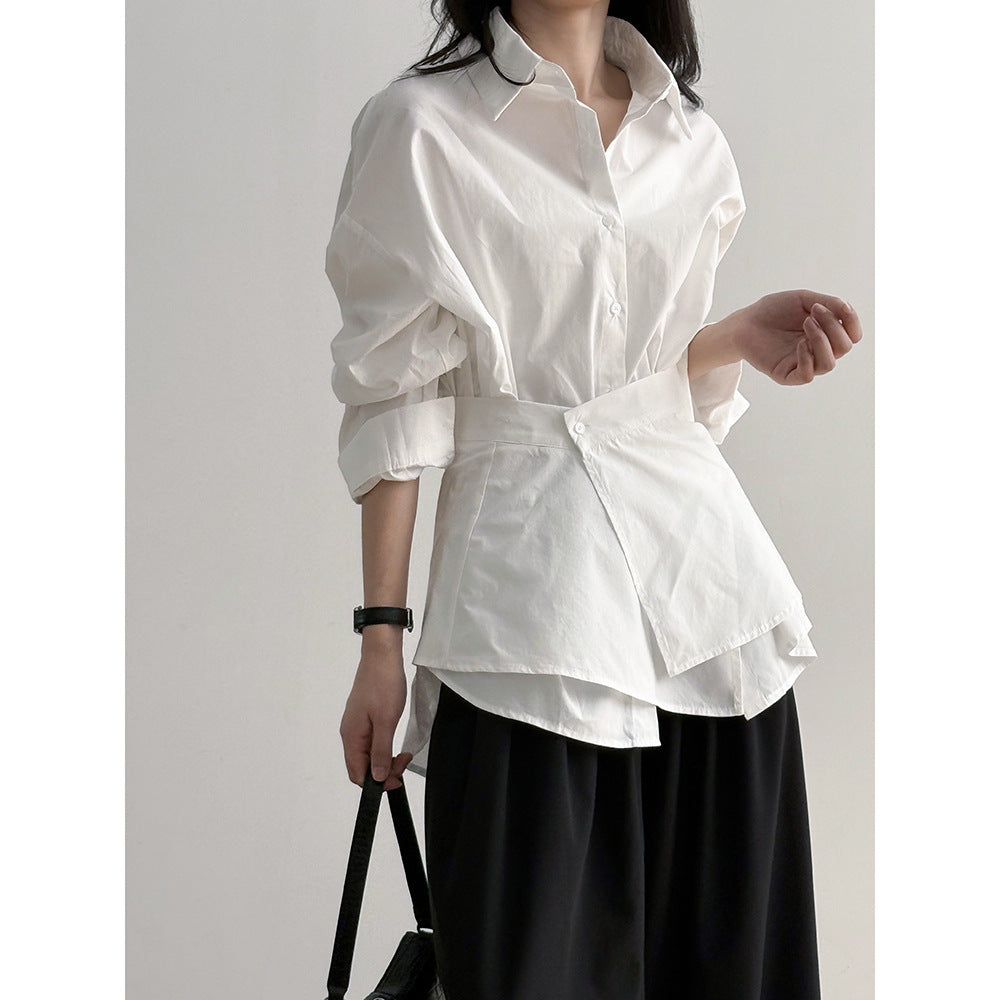 Damebluse med moderne omslagsdesign og elegante pufærmer Stilla