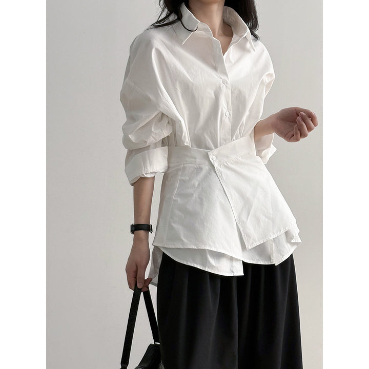 Damebluse med moderne omslagsdesign og elegante pufærmer Stilla