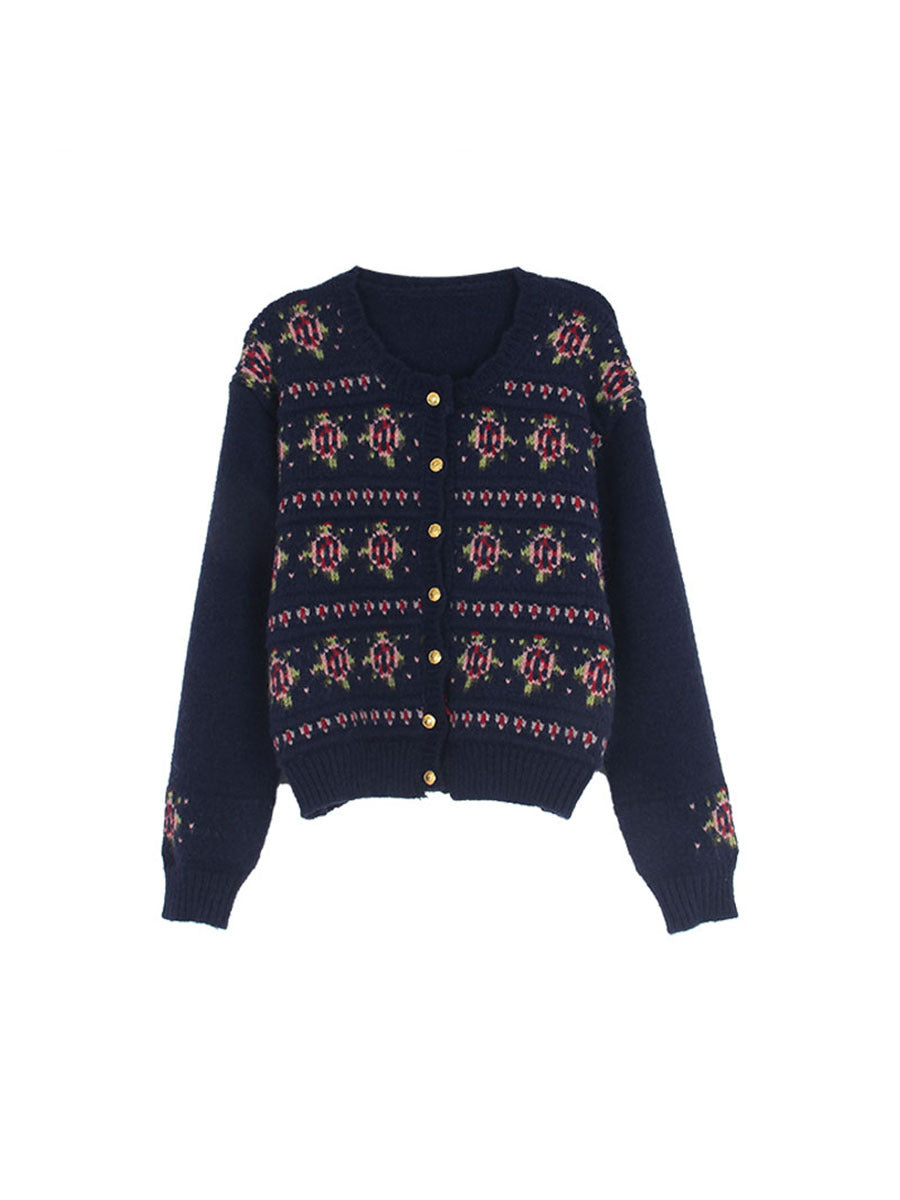 Dame strikket cardigan med blomsterdetaljer og knaplukning Stilla