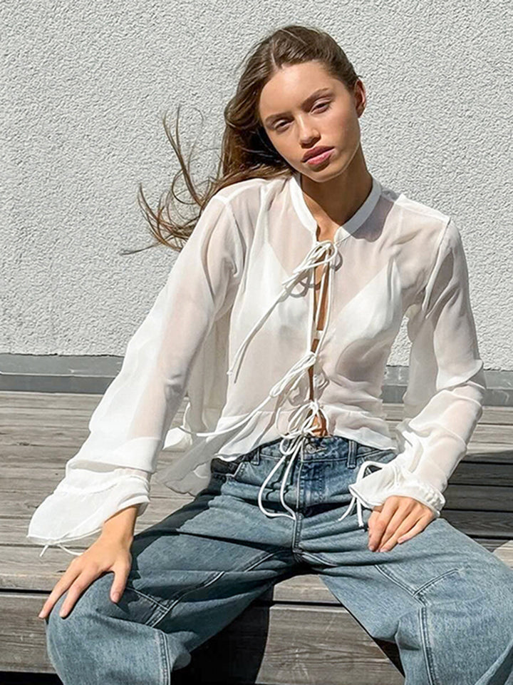 Dame afslappet chiffonbluse med justerbart snore-detalje og voluminøse ærmer Stilla