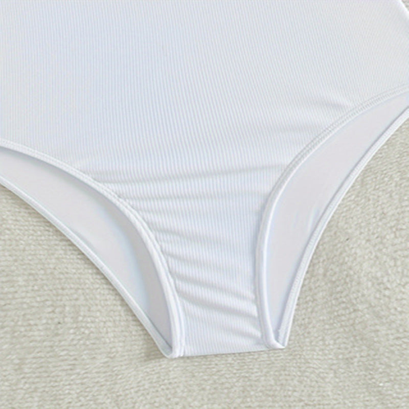 Dame asymmetrisk én-delt badeshorts med sløjfeaccent Stilla