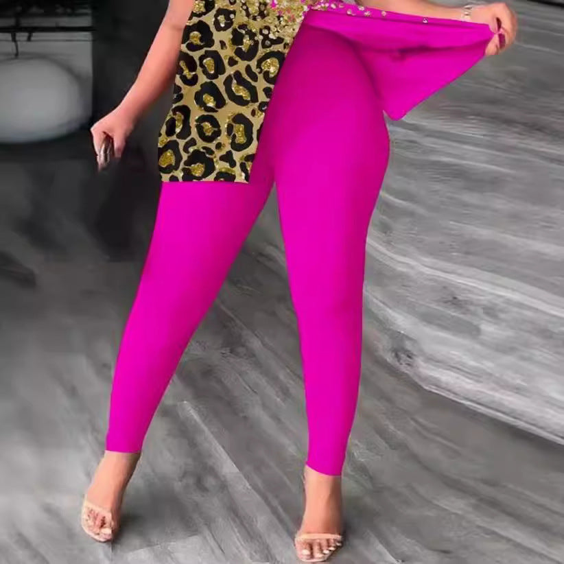 Dame figursyet jumpsuit med off-shoulder design og glamourøse accenter Skovae