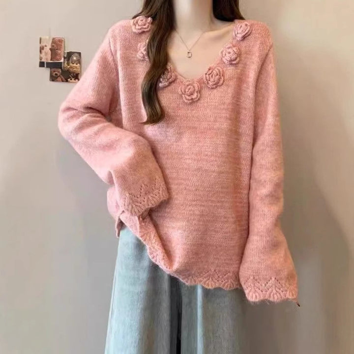 Kvinders store strikket sweater med blomsterapplikationer Stilla