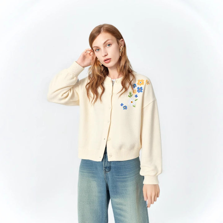 Kvinders chunky strik sweater med blomsterdetalje på ryggen og løs pasform Stilla