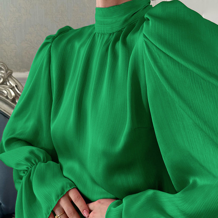 Dame wrapped dress with elegant ruffle details and high stand-up collar Stilla