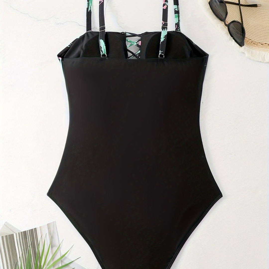Dame énslags badesuit med raffinerede flæsedetaljer og blomsteroberdel Skovae