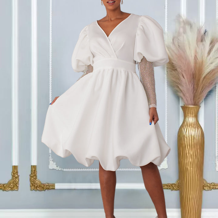 Dame viklerekjole med elegante puffærmer og livligt indslag Stilla