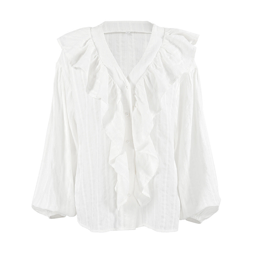 Damebluse med voluminøse flæser og elegant V-udskæring Stilla