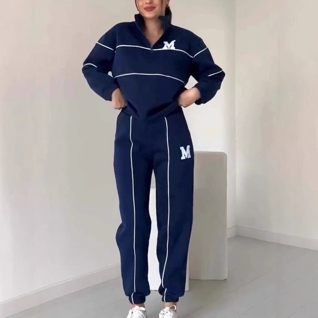 Kvinders sporty loungewear-sæt med halv lynlås og elastisk talje Stilla