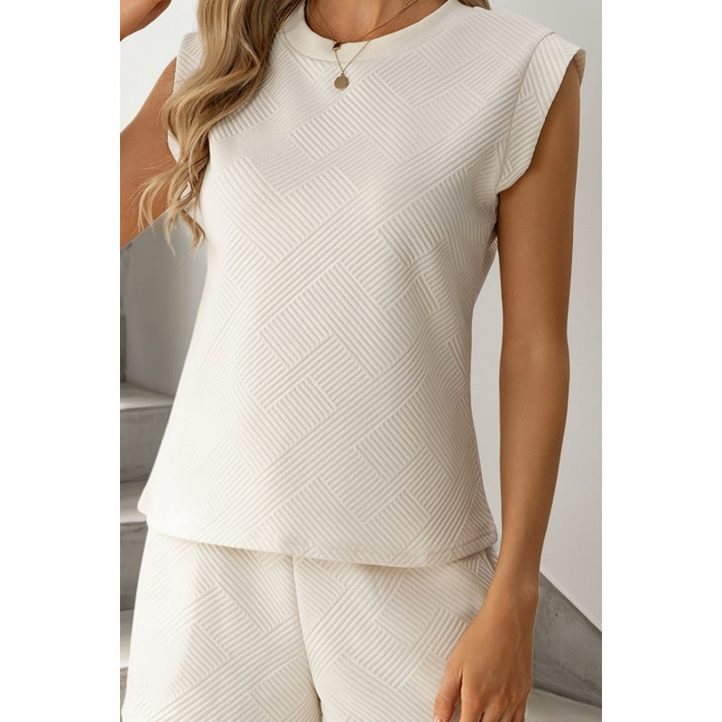Dame kortærmet jumpsuit med flæse detaljer og bindebælte Skovae