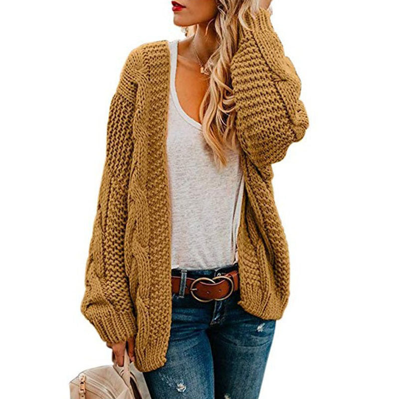 Kvinders chunky strikket cardigan med elegant kabelmønster og løs pasform Stilla