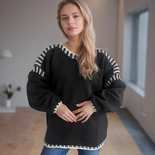 Kvinders chunky strikpullover med en afslappet pasform og stribede ærmer Stilla