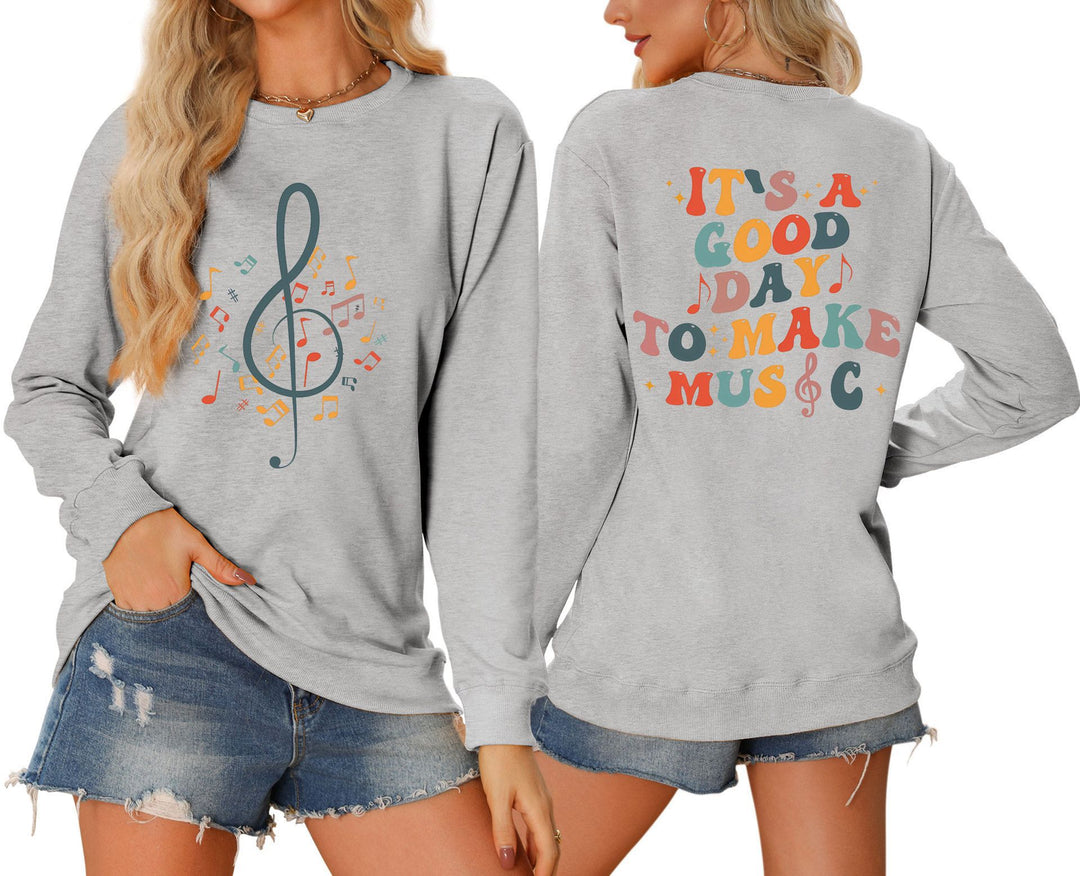 Damer sweatshirt med musikalsk motiv og kreativ tekst Stilla