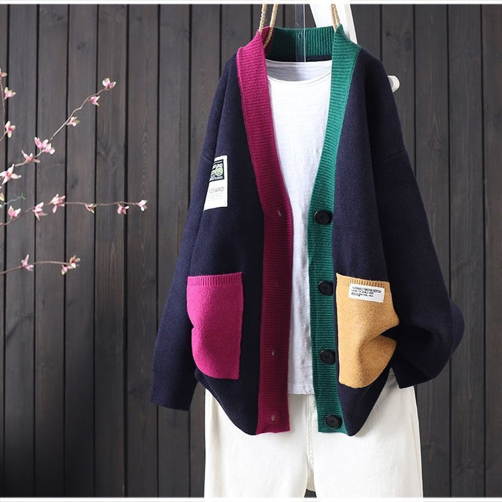 Kvinders oversized cardigan med farverige lommer og knapdetaljer Stilla