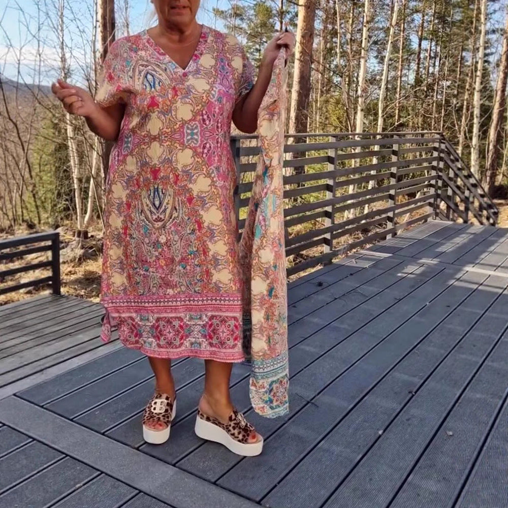 Dame nan flydende midikjole i tunika-kaftan-mix med V-udskæring, korte ærmer, løstsiddende pasform og matchende pareo Skovae
