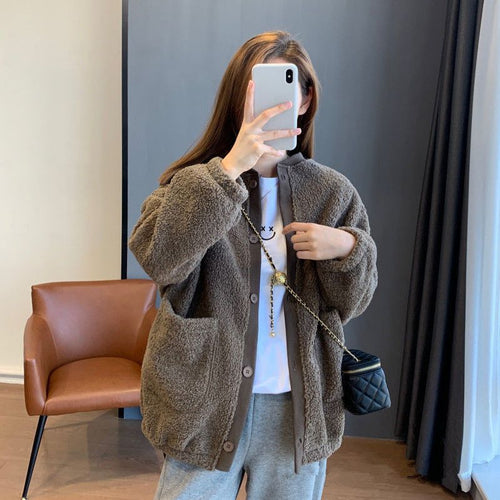 Kvindernes fluffy oversized jakke med store lommer