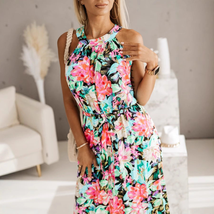 Dame maxikjole med flydende snit og blomstrende design Stilla
