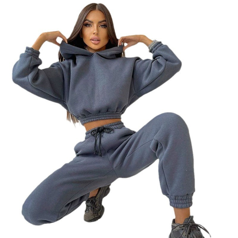 Kvinders sporty cropped sweat sæt med elastisk talje og praktiske lommer