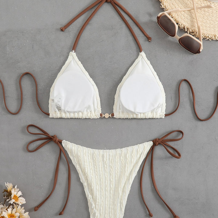 Dame triangelbikini med fin ribbestruktur og elegante bindebånd Skovae