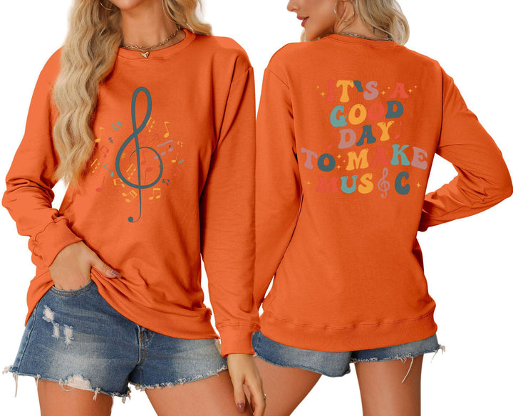 Damer sweatshirt med musikalsk motiv og kreativ tekst Stilla