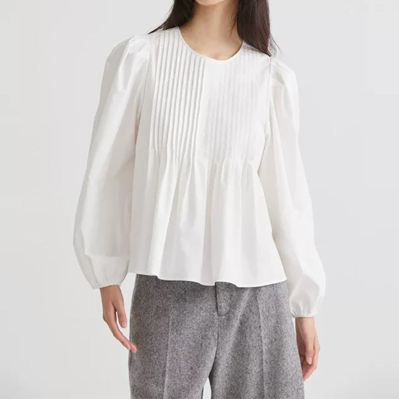 Damebluse med plisserede detaljer og voluminøse ærmer Stilla