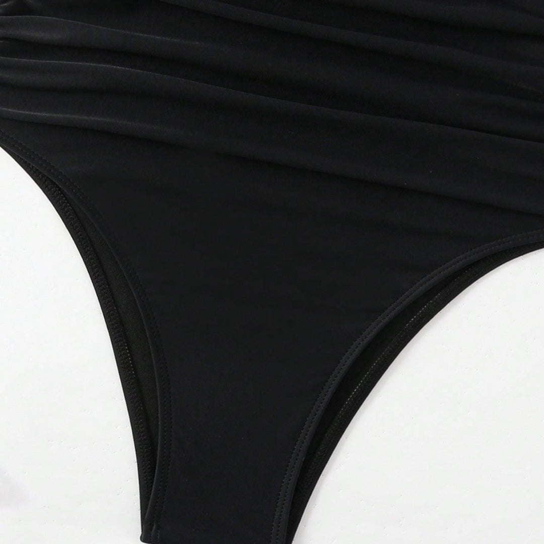 Dame Éntiler Badedragt med strategisk Cut-Out og raffinerede Ruffle-detaljer Stilla