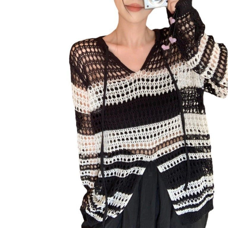Dame luftig strikket sweater med moderne netdesign og lange ærmer Stilla