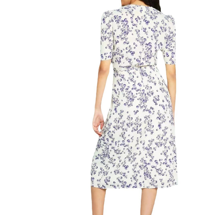 Dame wrap kjole med romantisk blomsterprint og feminine puffærmer Stilla