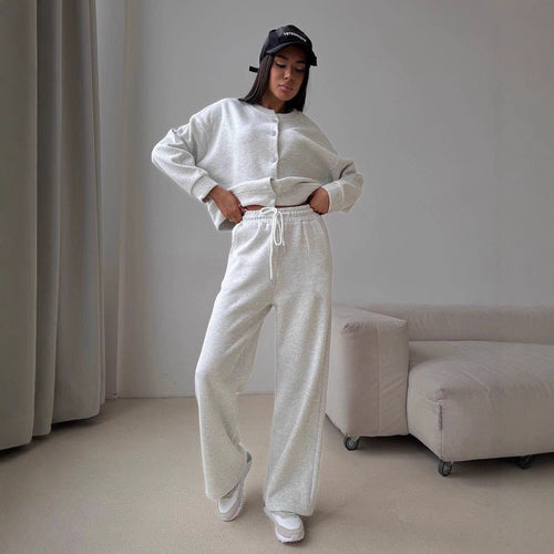 Kvinders afslappede hoodie jumpsuit med brede ben og knapdetaljer Skovae