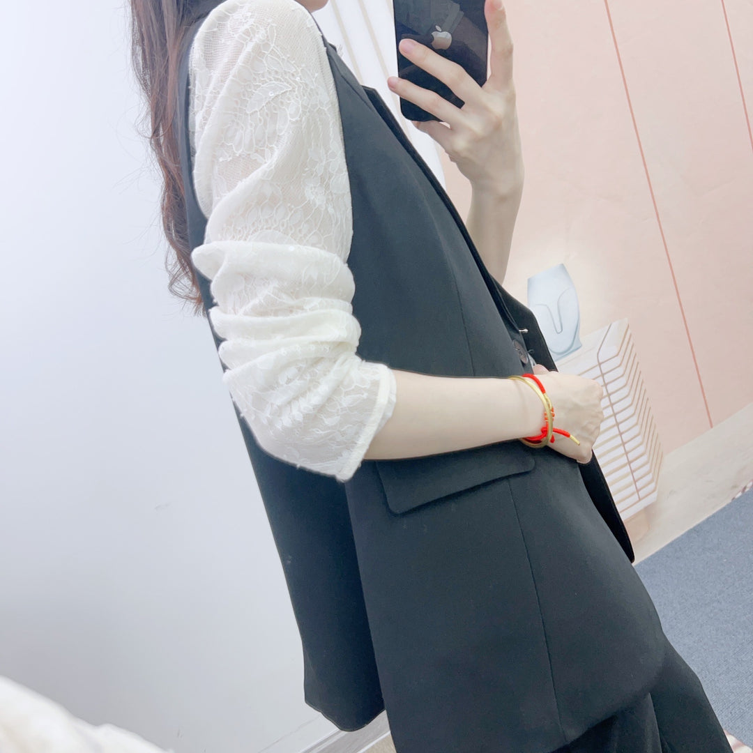 Dame elegant vest med dobbelt knapliste og struktureret design Stilla