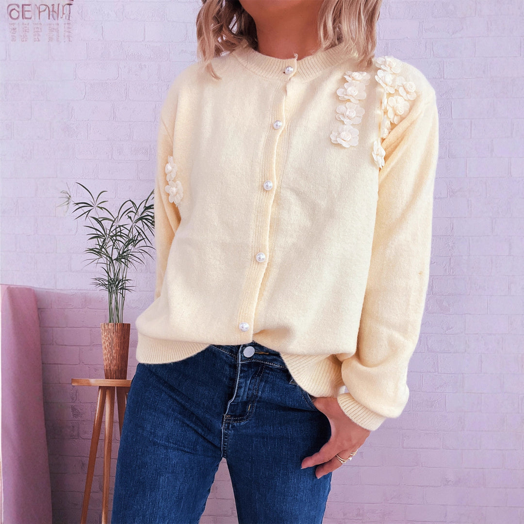 Kvinders cardigan med blomsterapplikationer og knapdetaljer Stilla