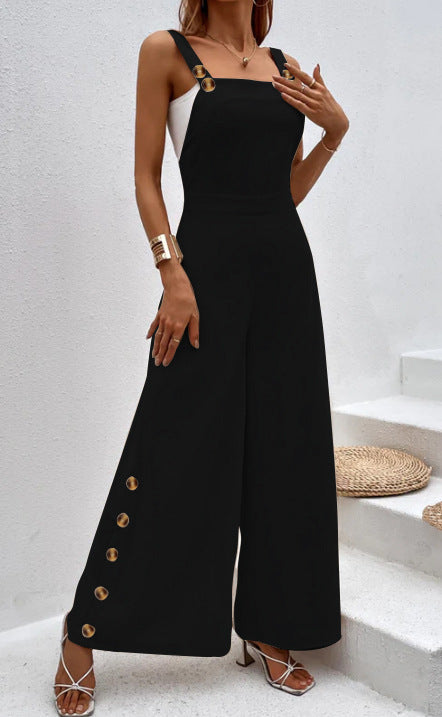 Dame jumpsuit i elegant snit med dekorative knapdetaljer Stilla