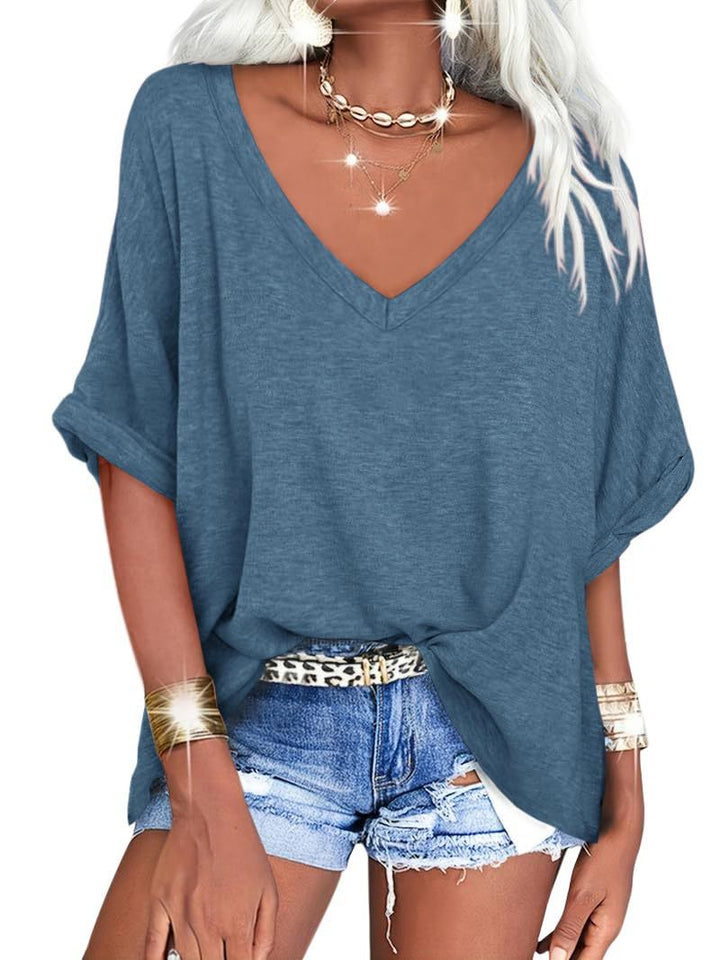 Dame afslappet V-hals T-shirt med oversized snit og plisseret detalje Stilla