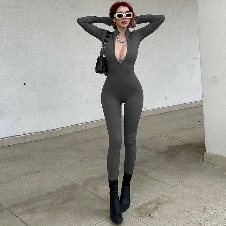 Damer tætsiddende jumpsuit med dyb V-udskæring og moderne ståkrave Stilla