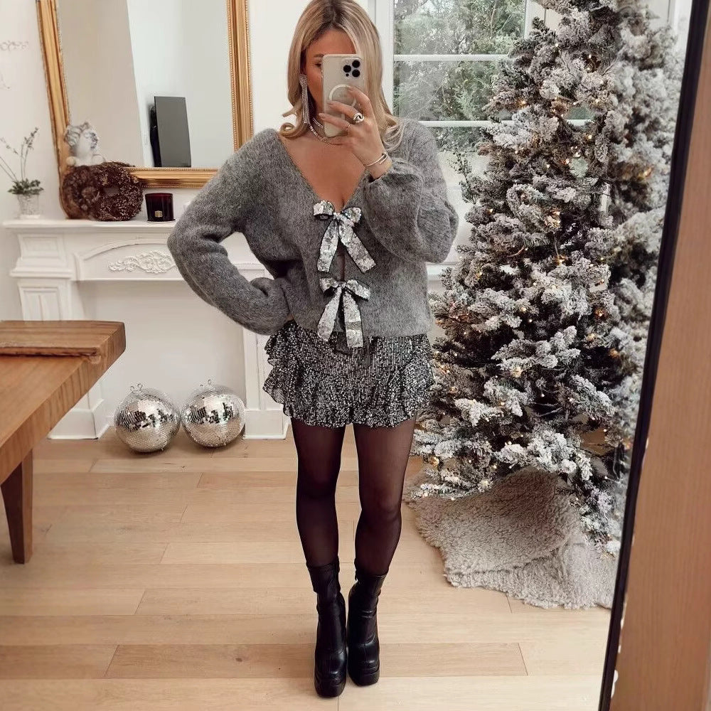 Kvindernes løse strikket cardigan med elegante bånddetaljer Stilla